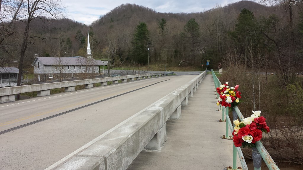 Memorial flowers on AT bridge